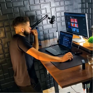 Igor Souza recording at the standing desk